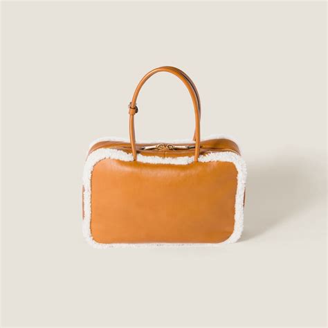 miu miu shearling bag|Cognac/natural Beau Shearling Top.